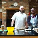 Chef Darren Hampton (left) of Home From Home Care leading cooking workshops for staff.