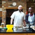 Chef Darren Hampton (left) of Home From Home Care leading cooking workshops for staff.