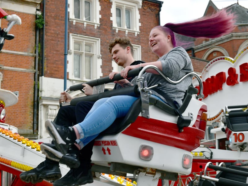 Bethony Thurlby and Jushua Thurlby, of Boston, having fun at the fair on Saturday.