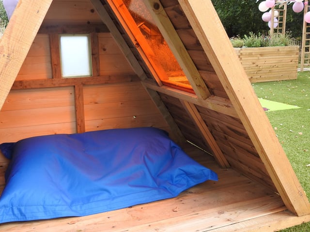 The pyramid den has coloured windows to cast interesting shadows and light.