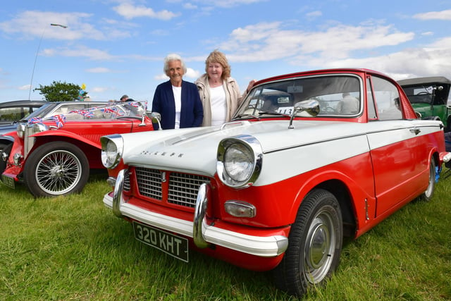 June McCreary, of Boston, and Diana Caunt, of Sibsey, with Diana's 1960 Triumph Herald Coupe.