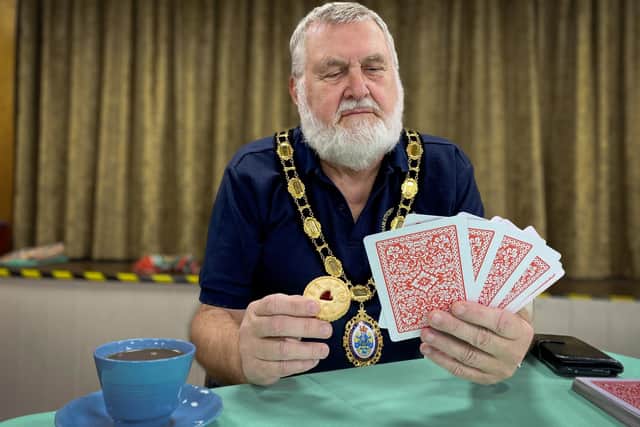 Mayor Steve Holland enjoying a game of cards.