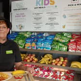 Asda Boston's café manager, Debbie Darrigan with an example of the £1 kids hot meal with fruit