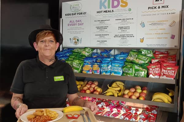 Asda Boston's café manager, Debbie Darrigan with an example of the £1 kids hot meal with fruit