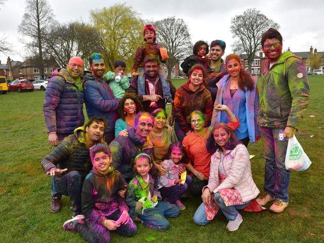 Some of the happy visitors to the Holi colours festival celebration in Boston's Central Park.