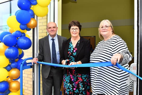 Ribbon cutting at St Bernard's new block, form left: David Rhodes, Chairman of Lincolnshire Wolds Federation; Patricia Bradwell from LCC; and Lea Mason, CEO of the Lincolnshire Wolds Federation. Photos: Mick Fox