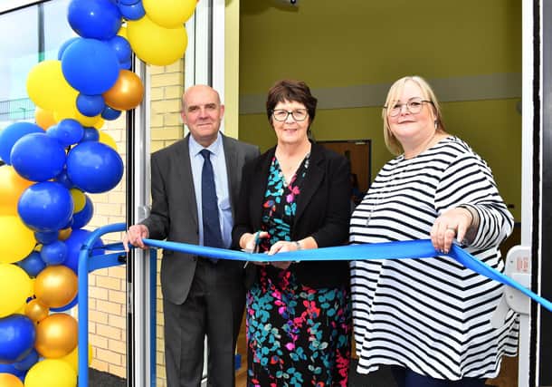 Ribbon cutting at St Bernard's new block, form left: David Rhodes, Chairman of Lincolnshire Wolds Federation; Patricia Bradwell from LCC; and Lea Mason, CEO of the Lincolnshire Wolds Federation. Photos: Mick Fox