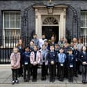 St Nicholas CofE Primary Academy pupils and staff gather outside No 10 Downing Street. Picture: Lauren Hurley/No 10 Downing Street