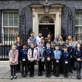 St Nicholas CofE Primary Academy pupils and staff gather outside No 10 Downing Street. Picture: Lauren Hurley/No 10 Downing Street