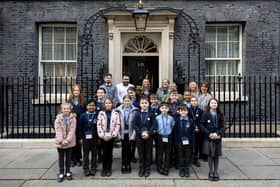 St Nicholas CofE Primary Academy pupils and staff gather outside No 10 Downing Street. Picture: Lauren Hurley/No 10 Downing Street