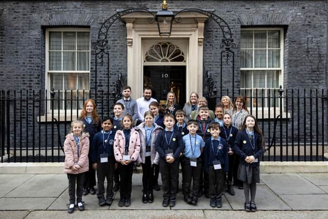 St Nicholas CofE Primary Academy pupils and staff gather outside No 10 Downing Street. Picture: Lauren Hurley/No 10 Downing Street