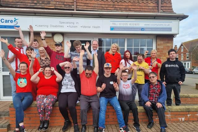 MP for Boston and Skegness Matt Warman with the clients and team at County Care in Skegness during their Comic Relief fundraiser.