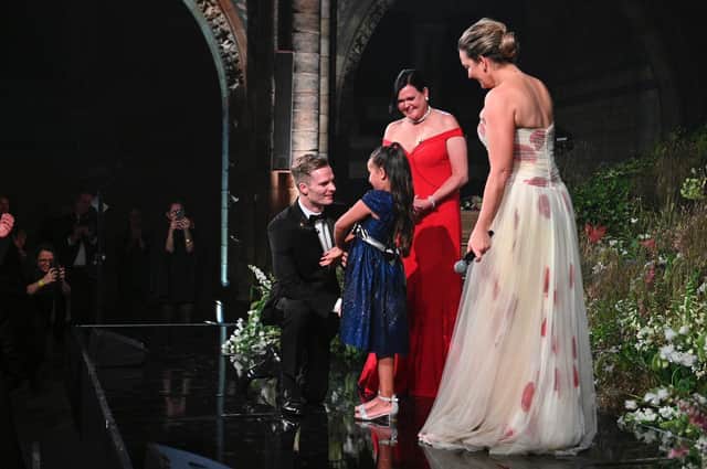 Robert Brookes meets little Demi, 7, her mum Dee Dee and CEO of DKMS.