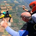 Richard Green, of Frampton, taking part in one of his two tandem skydives. Picture: Skydive Hibaldstow