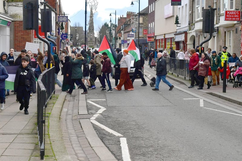 Palestine ceasefire protest march crosses Southgate on its way to the market place.