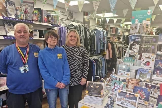 Shop manager Kerrie Mossop (right) with volunteers in the shop.