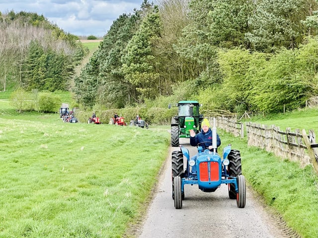 Leading the way: Ian Dawson gives a wave