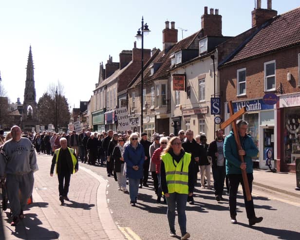Members of Sleaford churches in the procession behind the cross through Sleaford.