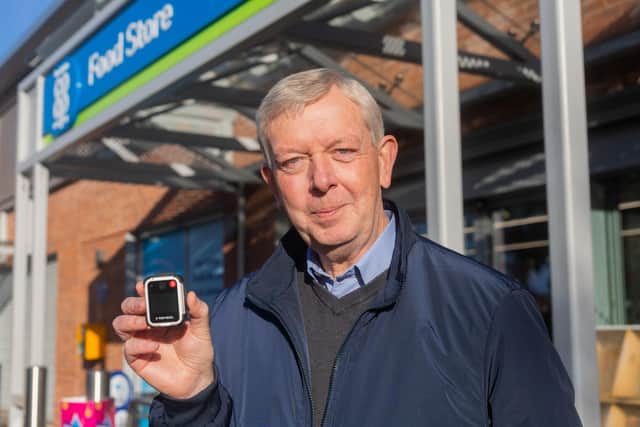 Lincolnshire Coop Security Manager Mark Foulds shows off one of the body cams. Photo: Morgan Christian