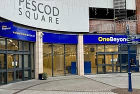 The OneBeyond signage in Boston's Pescod Square Shopping Centre.