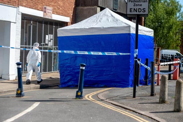 Forensics on the scene in Boston's Fountain Lane. Photos by John Aron