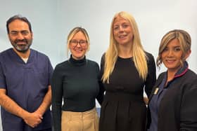 Laura Tunnard and Emily Dawson (centre, left to right) with Dr Naveed Yousaf and practice nurse Amanda Pycock, of Sutterton Surgery.