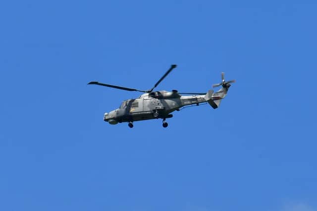 A Wildcat helicopter in the flypast.
