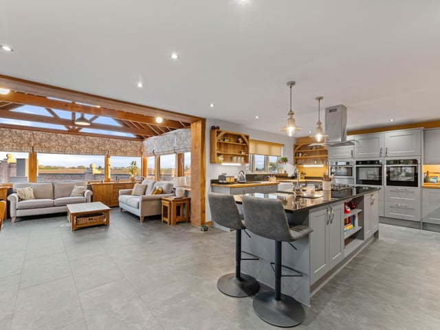 The open-plan living/dining/kitchen area.