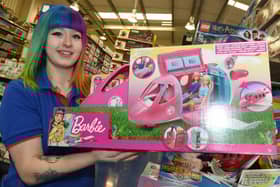Staff at Smyths Toy store.