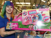 Staff at Smyths Toy store.