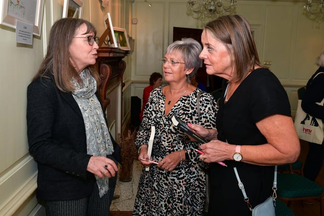 Author Janice Frost, left, talking to Jackie Morley and Kim Beresford at Boston Book Festival.