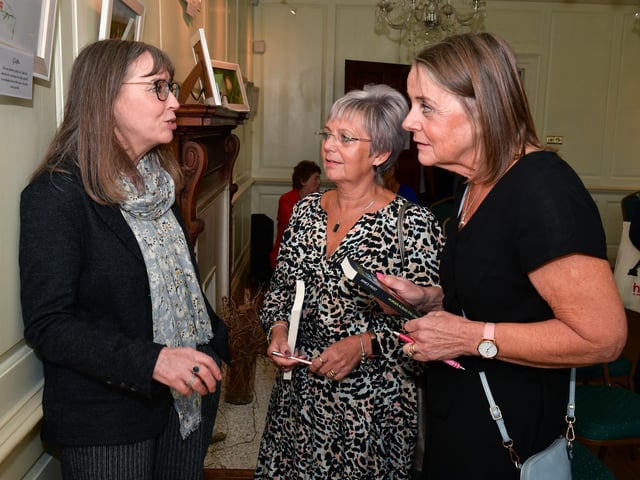 Author Janice Frost, left, talking to Jackie Morley and Kim Beresford at Boston Book Festival.