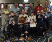Winners: (back L-R) Stephen Cockerham, George Carnall, Mark Clark, Maxine Downes; (front L-R) Trevor Halstead, Andrew Janney, Daniel Nicholson. Pic: Rachel Bradford.