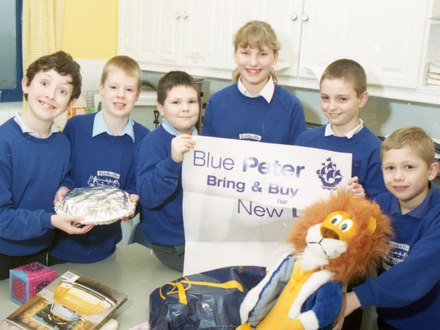 Youngsters at Frithville Primary School lending their support to Blue Peter's Bring and Buy For New Life campaign. Items for the sale were donated by the children and their families. The event, which was organised by pupils, also included a raffle and competitions.