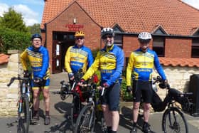 Riders departing from Heighington Village Hall.
