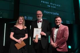 Coun Craig Leyland (centre), leader of East Lindsey District Council, collects the pride in your place award on behalf of the Horncastle Place team. (PHOTO BY: Destination Lincolnshire)