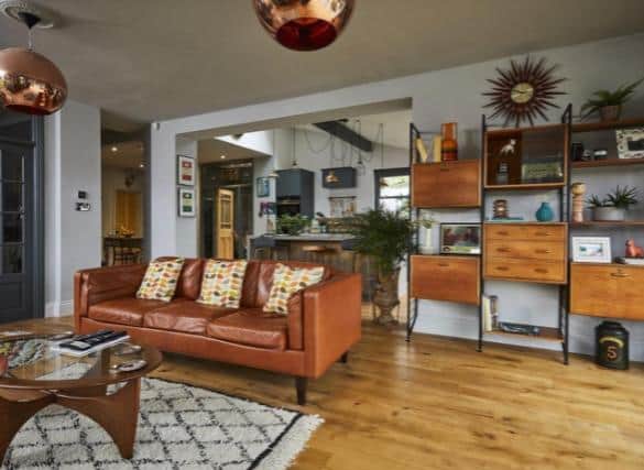 The sitting area with sofa from Heal's and vintage Ladderax shelving from eBay.