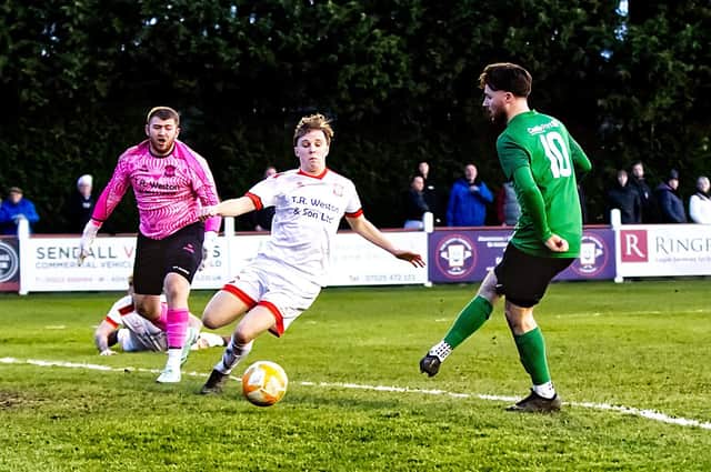 Ryan Lennon slots home the only goal of the game. Photo: Steve W Davies Photography.