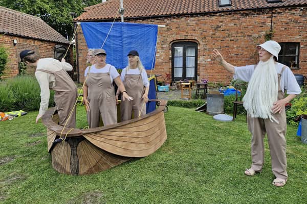 A scene from the modern mystery play, 'Who's My Brother?', as Noah and her family in their ark, discuss their plight with God.