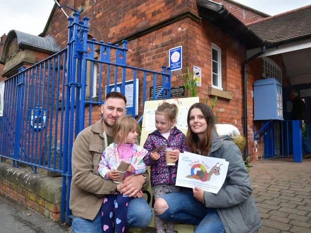 Ashley Watson, April Watson 2, Harley Watson 3 and Emma Macdonald of Louth, with seeds and pots from Wild About Louth, at Louth Museum. Photo: David Dawson