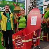 Asda Boston colleagues David Hewitt, Shirley Osborne and Frank Franklin with the collection trolley for Centrepoint Outreach.