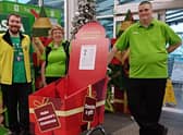 Asda Boston colleagues David Hewitt, Shirley Osborne and Frank Franklin with the collection trolley for Centrepoint Outreach.