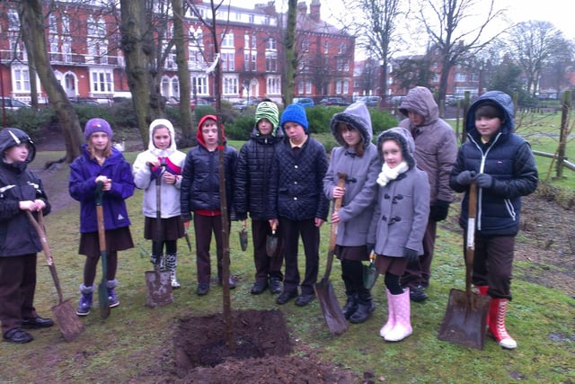 Youngsters from Skegness' Richmond Primary School are pictured 10 years ago planting oak trees in Tower Gardens to replace trees removed due to safety concerns.