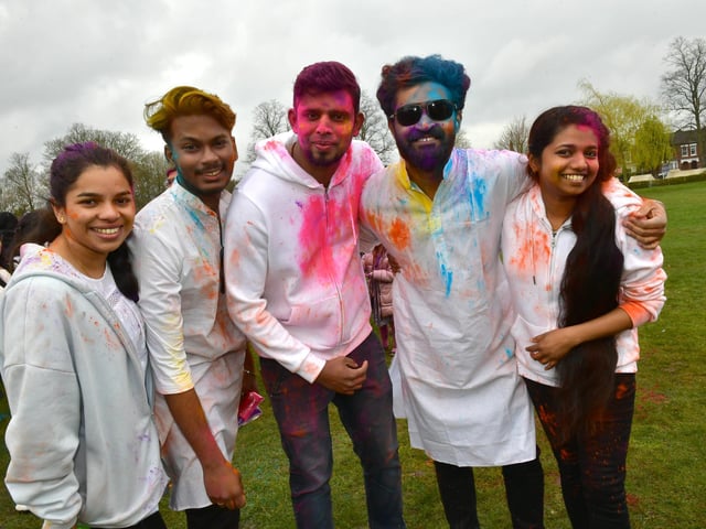 From left, Ashwini Chacko, Nidheesh Rajeswari, Sajo George, Vishnu Veetil, and Ashwathy Sajo at the Holi festival.