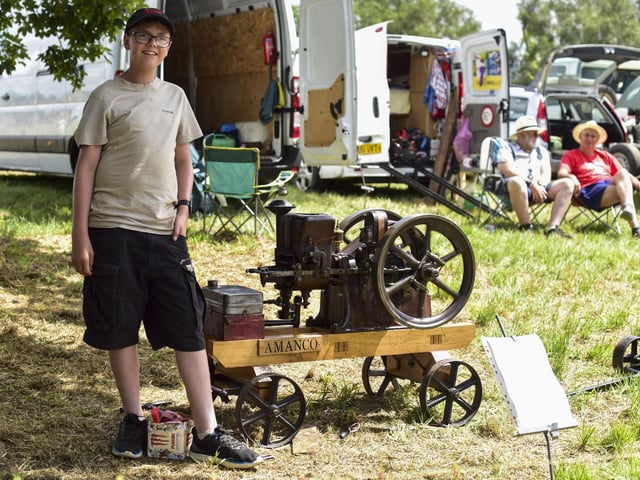 Jenson Vince, 15, with his Amanco Chore Boy stationary engine at Swaton Vintage Day. Photo: Holly Parkinson