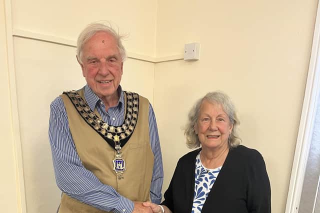 New Horncastle Town Council chairman Brian Burbidge with outgoing chairman Fiona Martin.