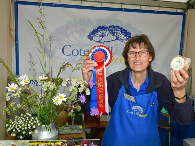 Mary Davenport of Cote Hill Cheese, Osgodby, Market Rasen, celebrating becoming Supreme Champions.