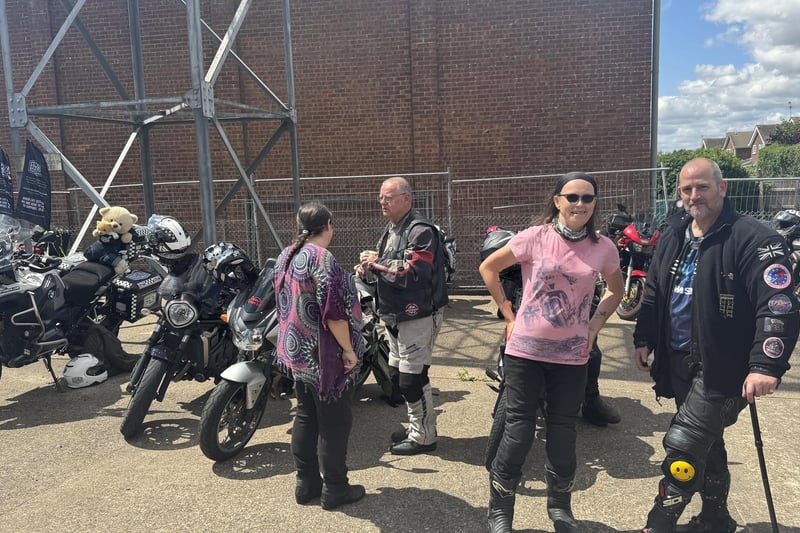 Kibi's stepmum Michelle Gardner at Caistor fire station with Kibi's mum Michelle Barrett (back to camera) thanking fellow bikers.