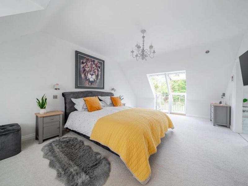 The main upstairs bedroom and ...