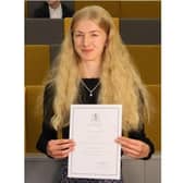 High School student Charlie Blair has scored the top mark in the country for her GCSE history exam.
